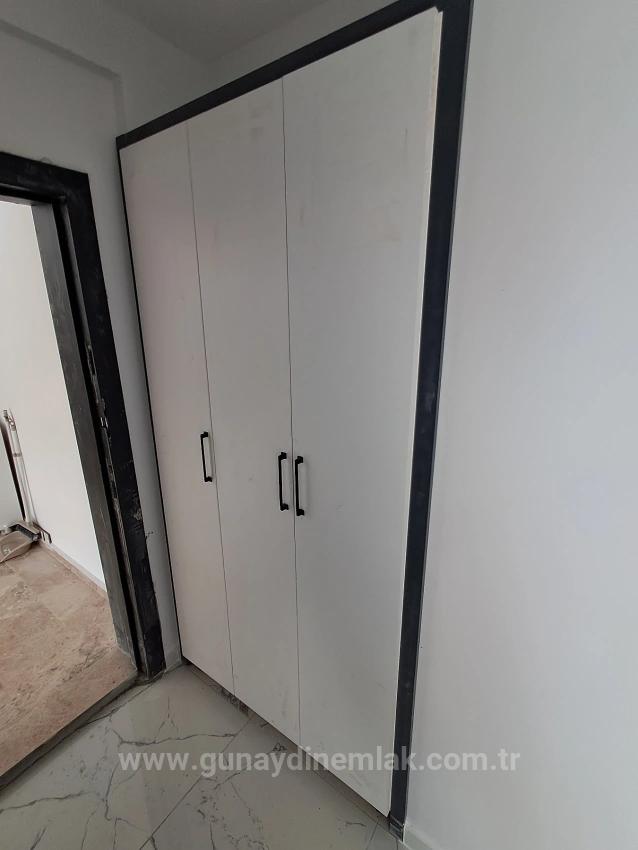 Brandneue 2+1 Wohnung Zum Verkauf In Ortaca Karaburun Mit Geschlossener Küche