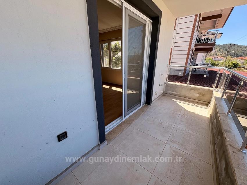 1+1-Apartment Zu Vermieten, 60 M2, Ortaca Karaburun Viertel.