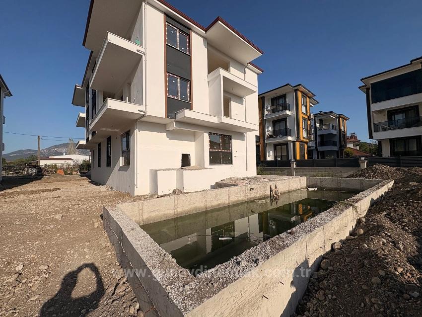 Brandneue 1+1-Wohnung Mit Pool Im Stadtteil Ortaca Çaylı Zu Verkaufen.