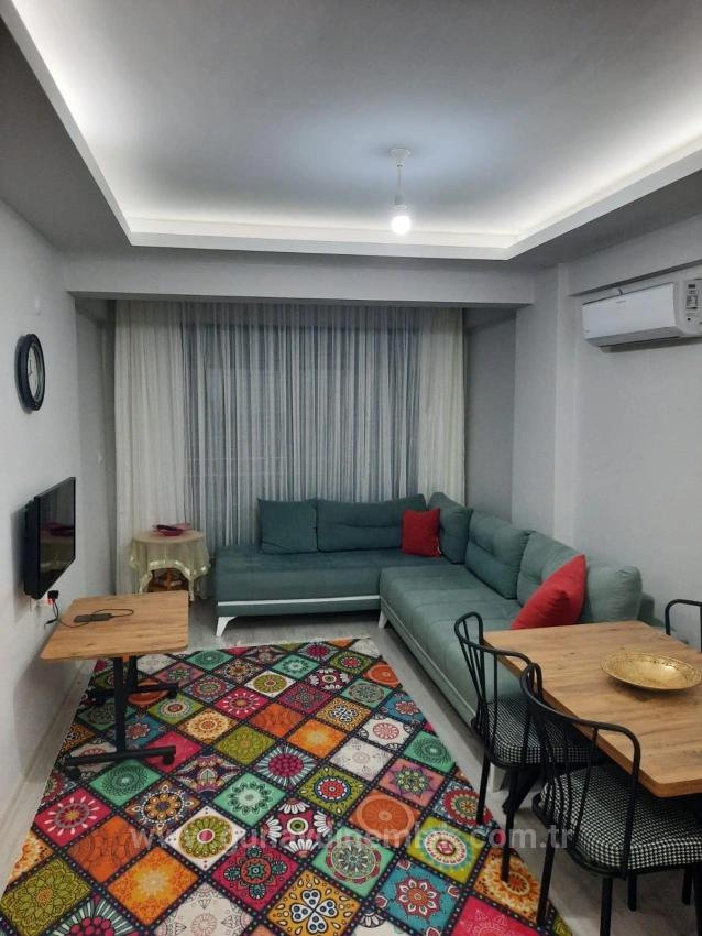 Voll Möbliertes 1+1-Apartment Im Stadtteil Ortaca Karaburun.