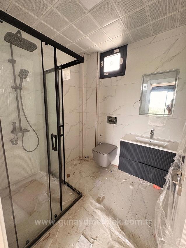 Moderne Luxusvilla Mit 3+1 Bädern Zum Verkauf Im Stadtteil Ortaca Dikmekavak.