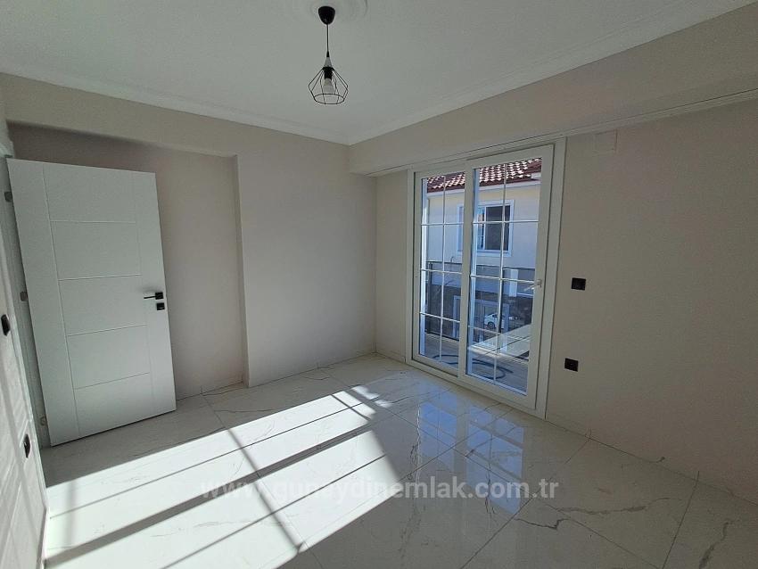 1+1-Apartment Mit Swimmingpool Und Fußbodenheizung In Ortaca Cumhuriyet Zu Verkaufen