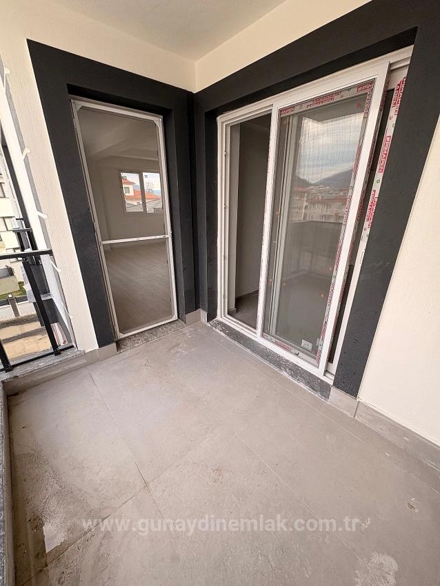 2+1 Brandneue Wohnung Mit Geschlossener Küche Zum Verkauf Im Stadtteil Arıkbaşı, Ortanca, Muğla.