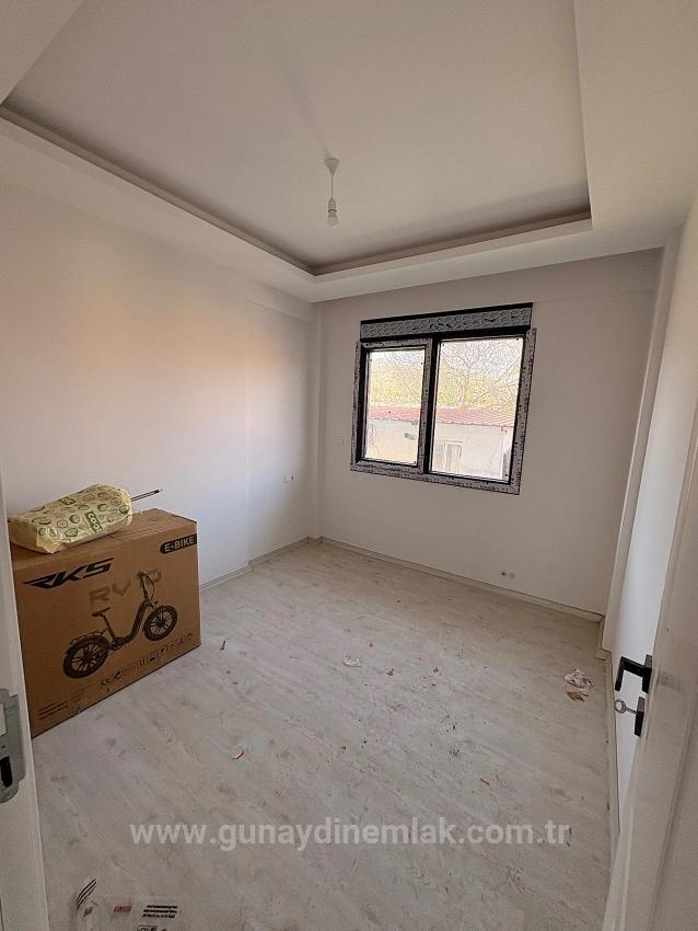 2+1-Zimmer-Wohnung Mit Geschlossener Küche Im Stadtteil Ortaca Karaburun Zu Verkaufen.