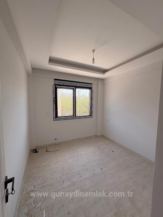 2+1-Zimmer-Wohnung Mit Geschlossener Küche Im Stadtteil Ortaca Karaburun Zu Verkaufen.