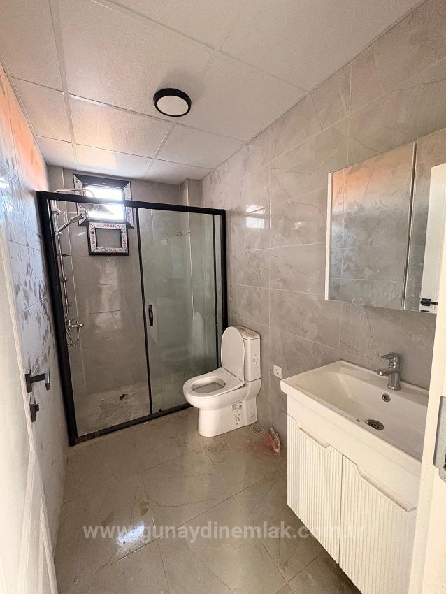 2+1-Zimmer-Wohnung Mit Geschlossener Küche Im Stadtteil Ortaca Karaburun Zu Verkaufen.