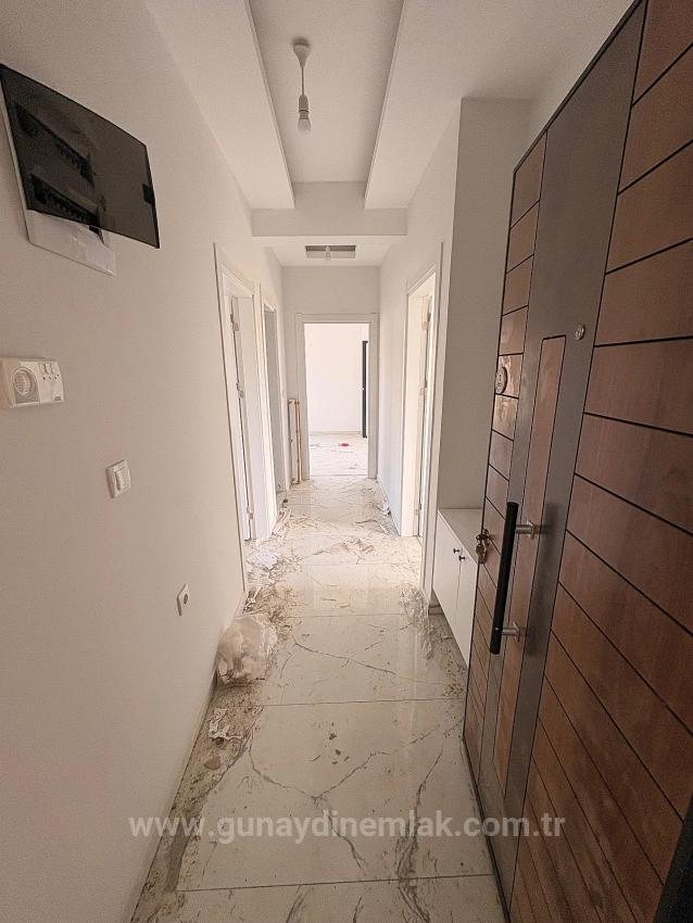 2+1-Zimmer-Wohnung Mit Geschlossener Küche Im Stadtteil Ortaca Karaburun Zu Verkaufen.