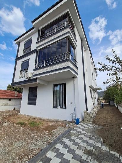 Brandneue 2+1 Wohnung Zum Verkauf In Ortaca Karaburun Mit Geschlossener Küche