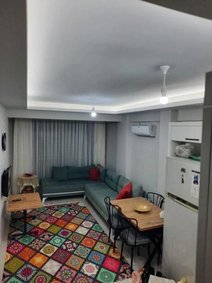 Voll Möbliertes 1+1-Apartment Im Stadtteil Ortaca Karaburun.