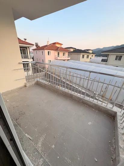 Großzügige 1+1-wohnung Zum Verkauf Im Stadtteil Ortaca Karaburun.