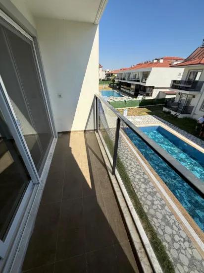 Ortaca Karaburun In einem Schwimmbad-siedlung gemietete 2+1 Wohnung