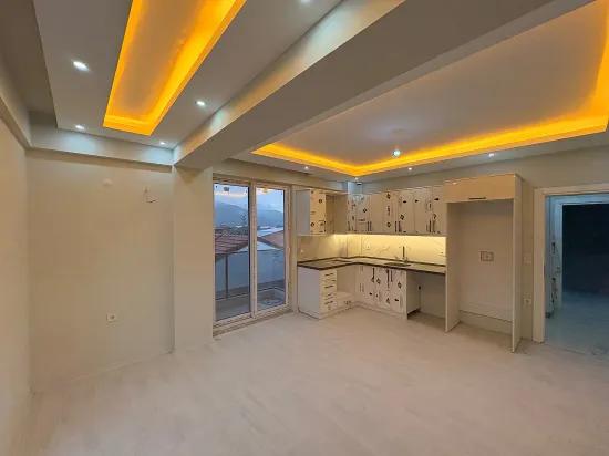 In Ortaca Cumhuriyet Neubau 1+1 Wohnung zu verkaufen, Eigentumswohnung, kreditgeeignet