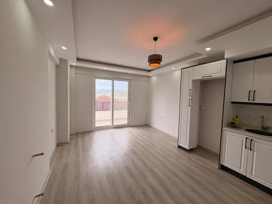 In Ortaca Çaylı zu vermieten 1+1 Wohnung, mit Pool Im Wohnkomplex, mit Einbauküche