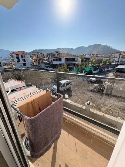 In Ortaca Çaylı mit Pool 2+1 zu verkaufen Wohnung, Eigentumswohnung, Zwischengeschoss
