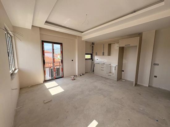 1+1-Zimmer-Wohnung Mit Großem Pool Im Stadtteil Karaburun, Ortaca, Muğla Zu Verkaufen
