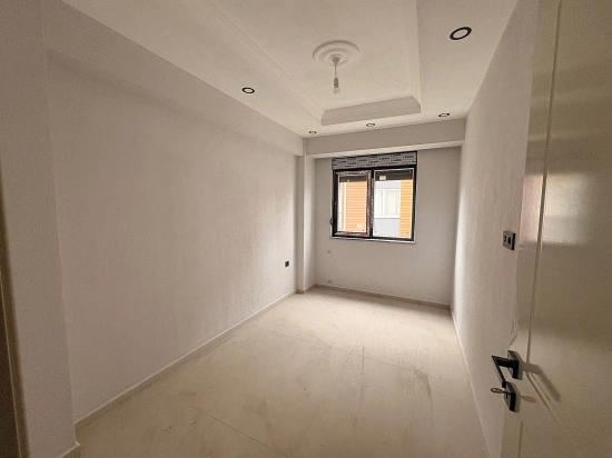 2+1-Zimmer-Wohnung Mit Geschlossener Küche Im Viertel Terzialiler, Ortaca, Muğla Zu Verkaufen.