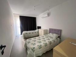 Luxuriöse 2+1-Wohnung Mit Fußbodenheizung Und Geschlossener Küche Im Ortaca Center Zu Verkaufen