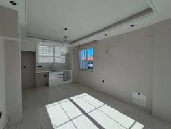 1+1-Apartment Mit Swimmingpool Und Fußbodenheizung In Ortaca Cumhuriyet Zu Verkaufen