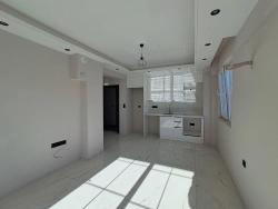 1+1-Apartment Mit Swimmingpool Und Fußbodenheizung In Ortaca Cumhuriyet Zu Verkaufen