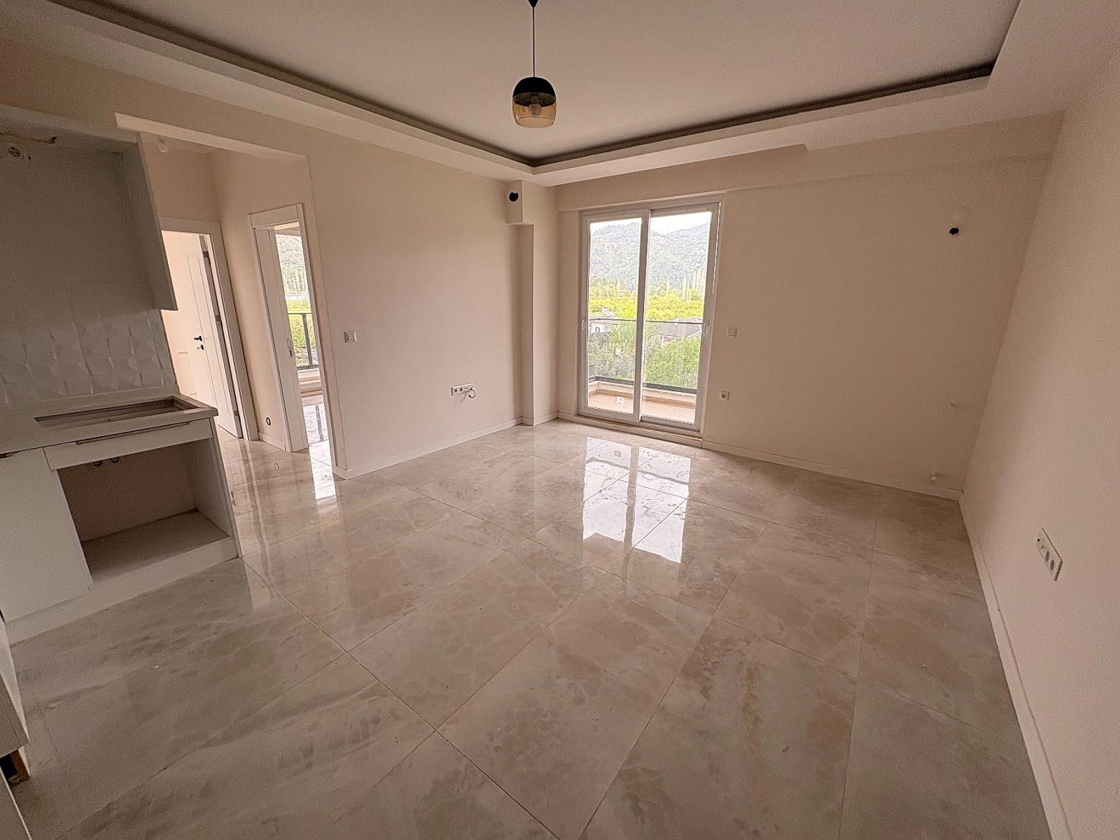 2+1 Apartment With Pool For Sale In Ortaca Çaylı Neighborhood.