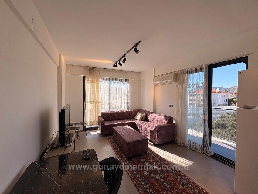 Fully Furnished 1+1 Apartment For Rent In Ortaca Karaburun Neighborhood.