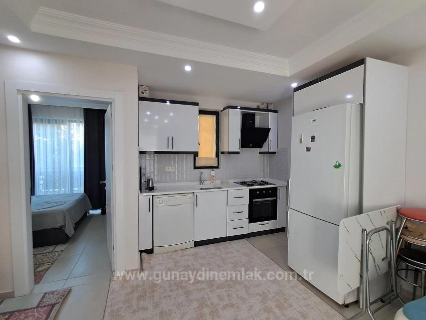 1+1 Furnished Apartment For Sale With Tourism Operation Certificate In Ortaca Karaburun