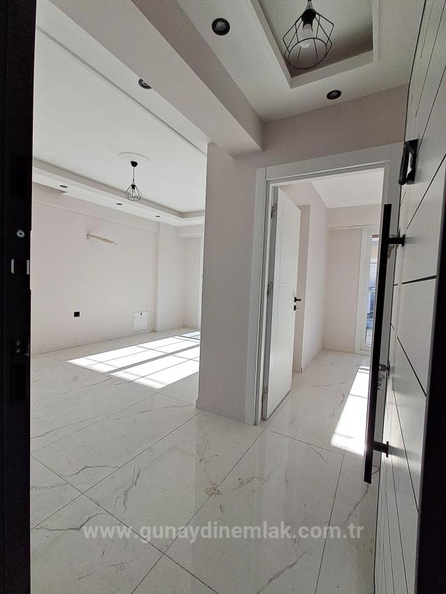 1+1 Apartment With Swimming Pool And Underfloor Heating For Sale In Ortaca Cumhuriyet