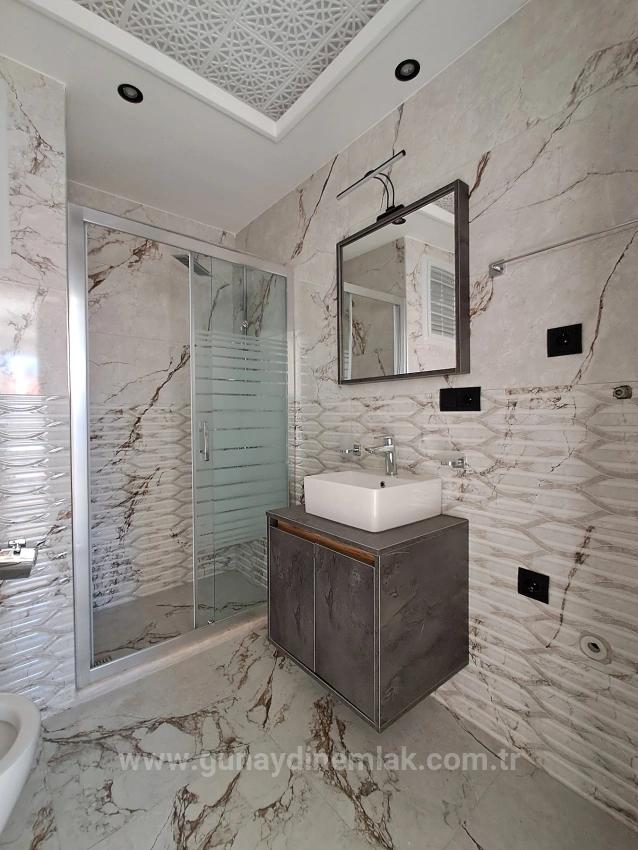 1+1 Apartment With Swimming Pool And Underfloor Heating For Sale In Ortaca Cumhuriyet