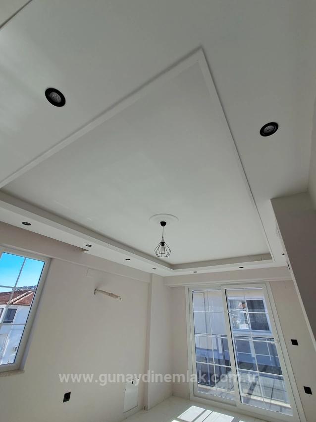 1+1 Apartment With Swimming Pool And Underfloor Heating For Sale In Ortaca Cumhuriyet