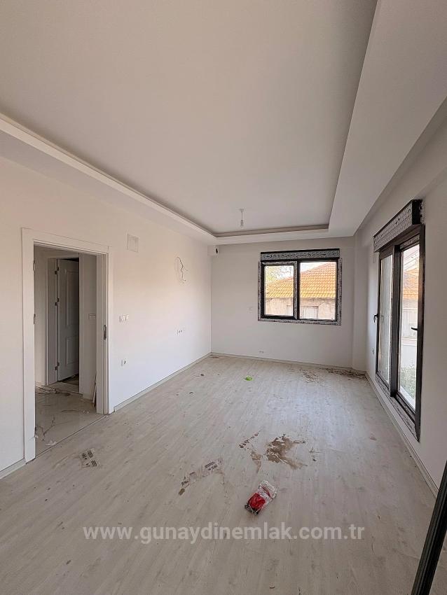 2+1 Apartment With Closed Kitchen For Sale In Ortaca Karaburun Neighborhood.