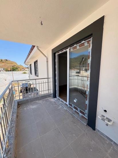 Spacious 1+1 Apartment For Sale In Ortaca Karaburun Neighborhood.