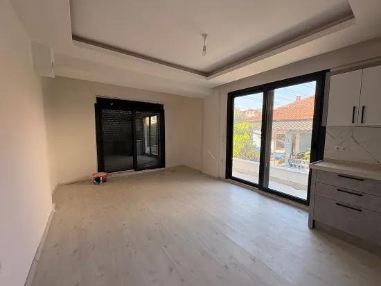 Spacious 2+1 Apartment For Sale In Ortaca Karaburun Neighborhood.