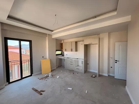 1+1 Apartment For Sale With Large Pool In Karaburun Neighborhood, Ortaca, Muğla