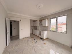 1+1 Apartment For Sale In Ortaca Cumhuriyet Neighborhood.