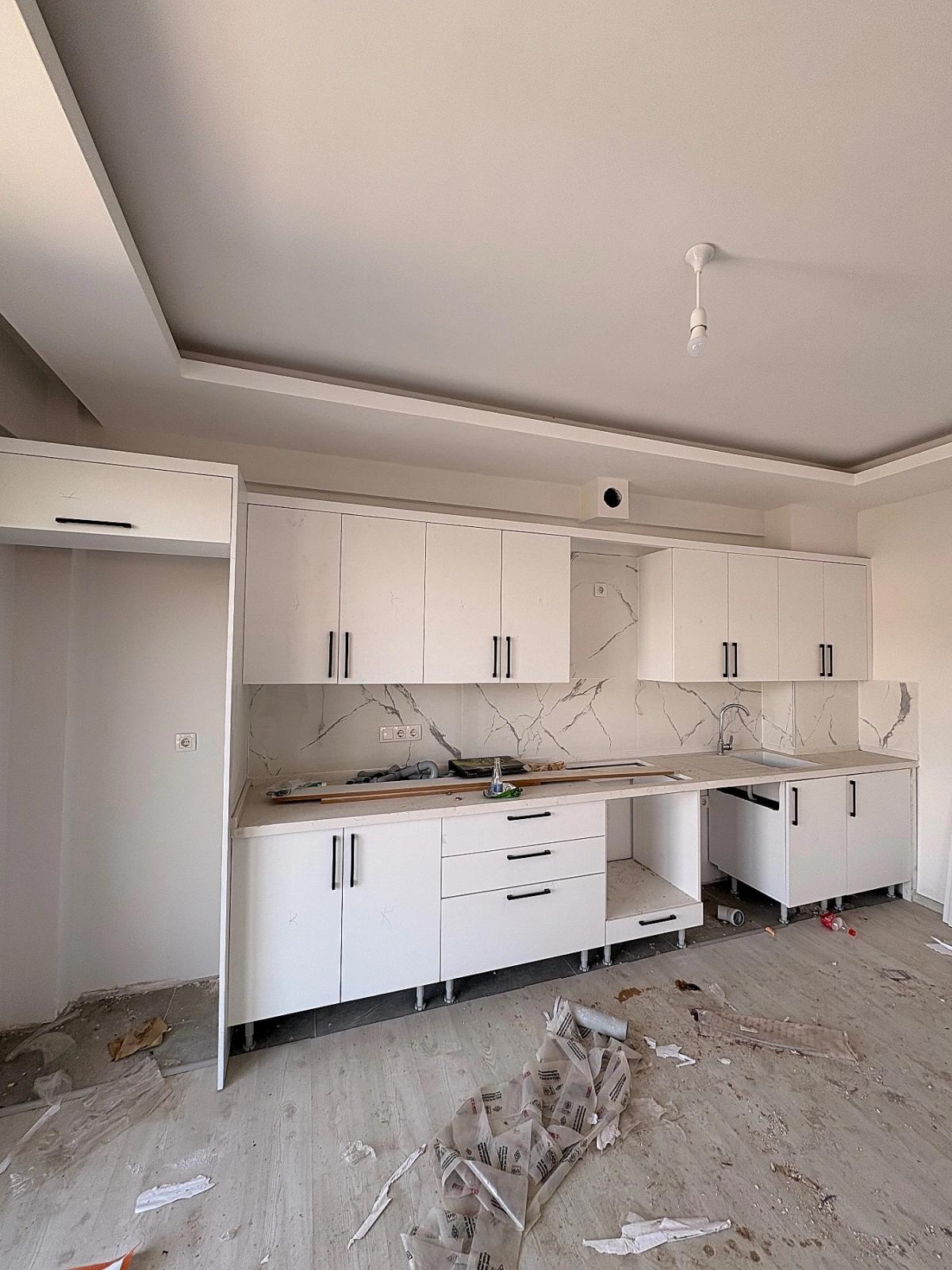 Продается 2+1 Квартира С Закрытой Кухней В Районе Карабурун, Ортача.