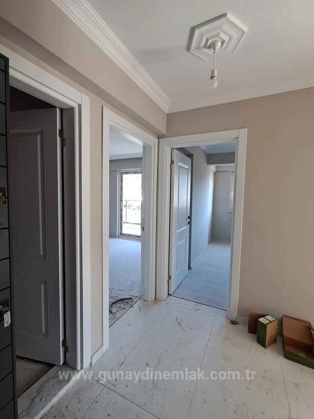 Агентство Недвижимости Günaydın Предлагает На Продажу Квартиру С 2 Спальнями И 1 Ванной Комнатой, А Также Бассейном, В Районе Ататюрк.