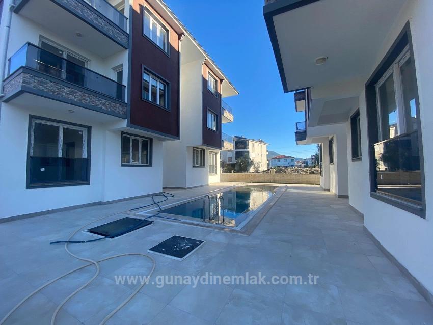 Новая Квартира 1+1 В Жилом Комплексе С Бассейном В Районе Даламан Сёгютлююрт.