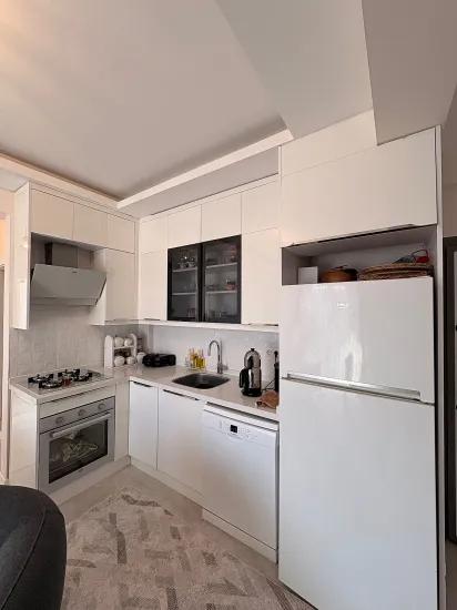 в Ortaca Çaylı с бассейном 2+1 на продажу квартира, Этаж собственность, промежуточный этаж