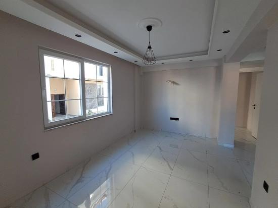 В Районе Джумхуриет Продается Квартира С 2 Спальнями, 1 Ванной Комнатой, Отдельным Входом И Бассейном От Агентства Недвижимости Günaydın Real Estate.