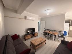 Продается Новая Меблированная Квартира 3+1 С Бассейном В Районе Карабурун, Ортаджа, Мугла.