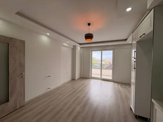 Ortaca Çaylı da kiralık 1+1 daire, havuzlu sitede, ankastre setli