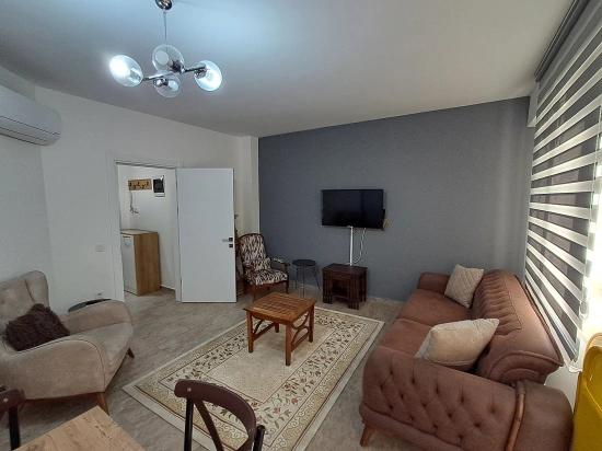 Günaydın Emlaktan Karaburunda Havuzlu Site Eşyalı 2+1 Kiralık Daire