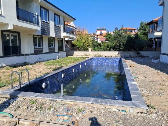 Günaydın Emlaktan Atatürk Mahallesinde 2+1 Havuzlu Satılık Daire