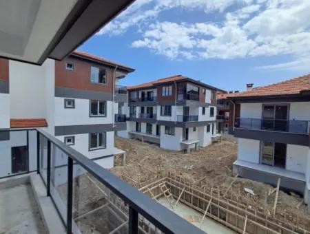 Ortaca Karaburunda Yüzme Havuzlu Sitede Satılık 2+1 Daire