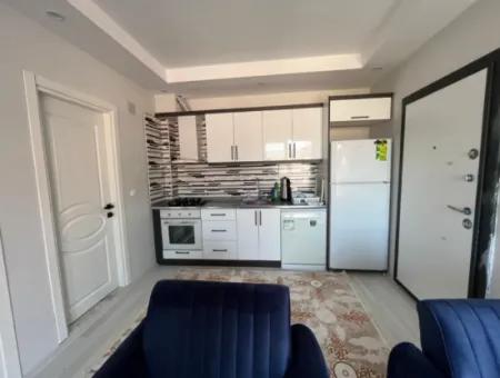 Dalaman Cadde Üzerinde Eşyalı 1+1 Satılık Daire