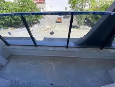 Dalaman Merkezde Sıfır Geniş 1+1 Satılık Daire