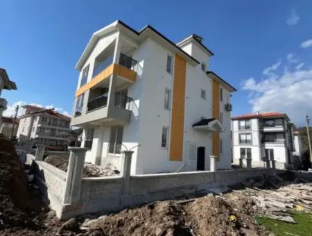 Günaydın Emlak'tan Ortaca Çaylıda 1+1 Geniş Lüks 75 M2 Satılık Daire.