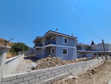 Günaydın Emlak'tan Ortaca Yerbelende Havuzlu 1+1 Satılık Daire